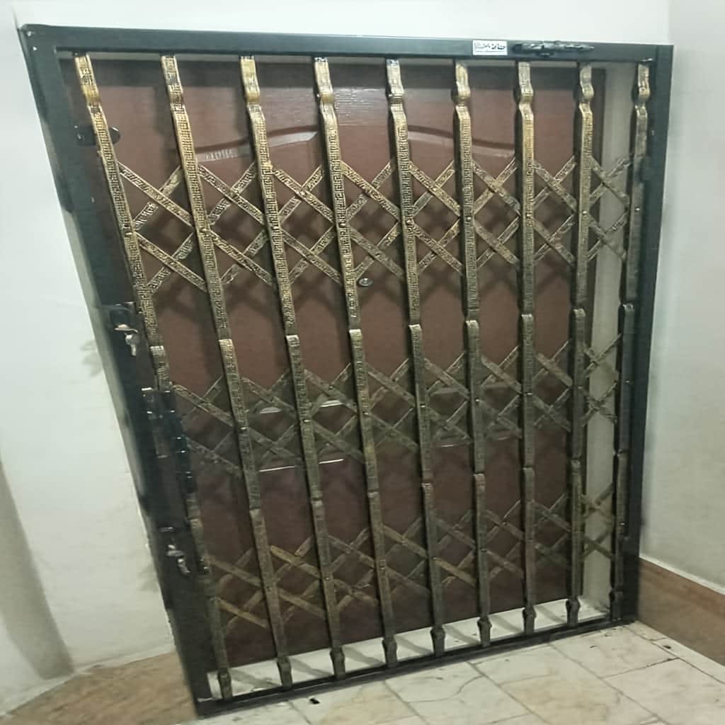 فروش حفاظ درب آکاردئونی آهنی سه گل در همدان
