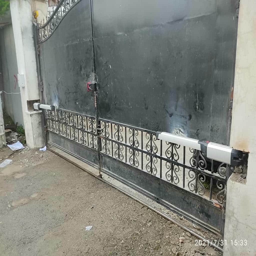 نصب جک درب پارکینگ برقی لولایی در محمدشهر