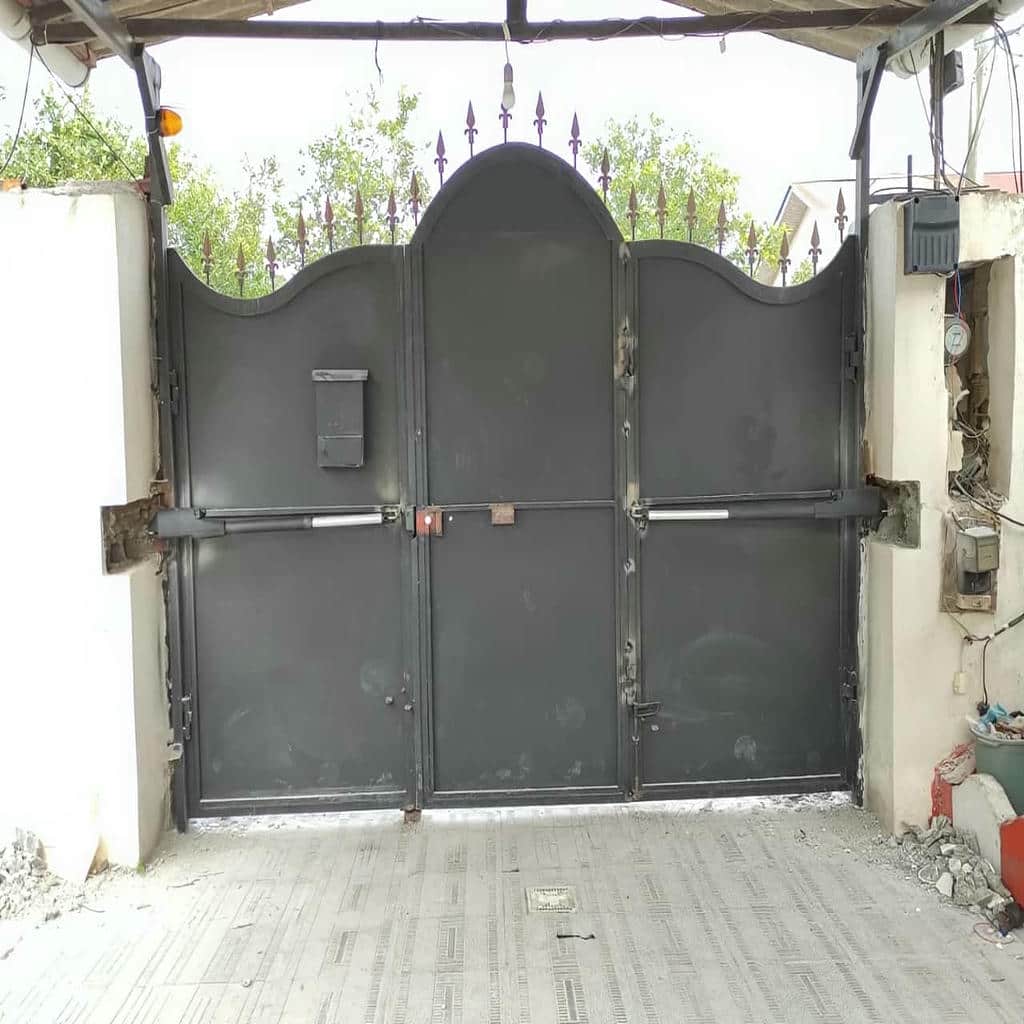 نصب جک درب پارکینگ برقی درب لولایی در مریوان