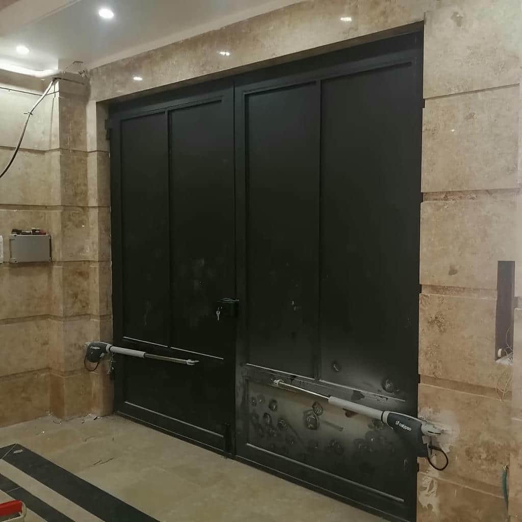 نصب جک درب پارکینگ برقی لولایی در اشتهارد