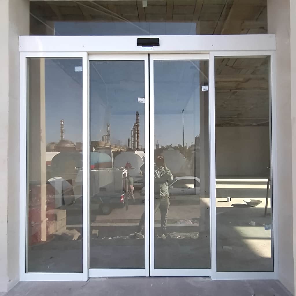 نصب درب اتوماتیک شیشه ای فریم لس کشویی