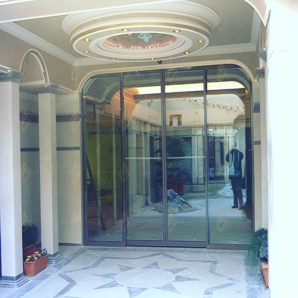 خرید درب اتوماتیک شیشه ای برای ورودی ساختمان اداری