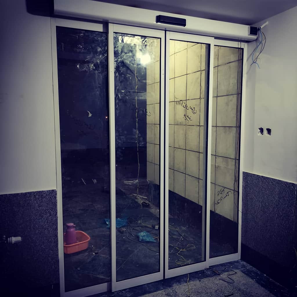 درب شیشه ای تلسکوپی دوطرفه برای ورودی متقارن