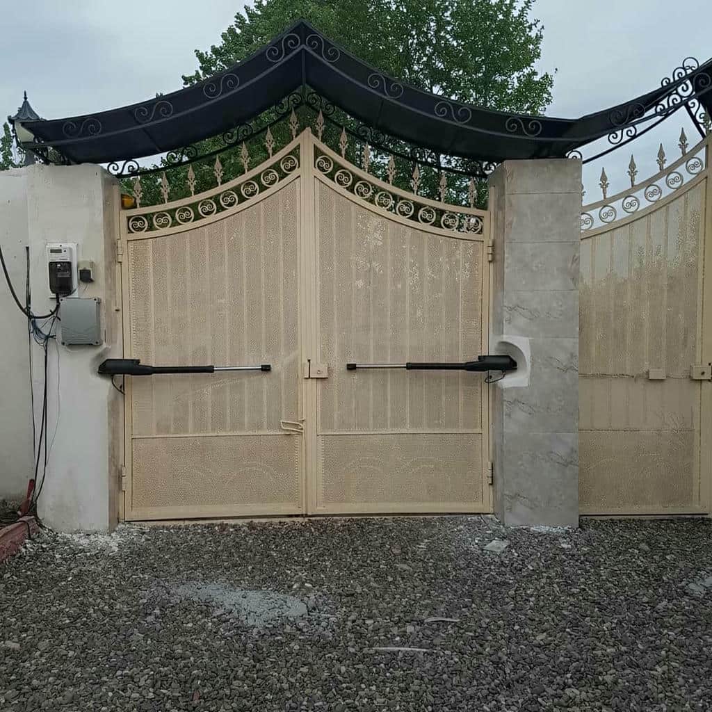 تعمیر درب برقی ویلایی دو لنگه و رفع ایراد جک